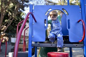 Kid climbing in playground